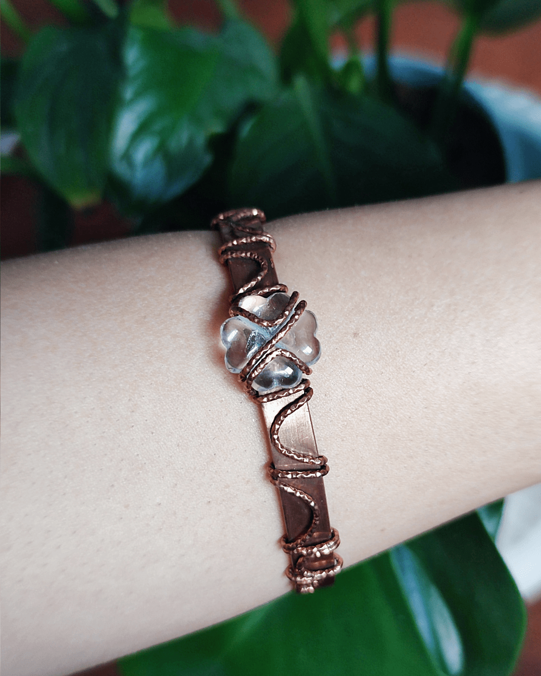 Elevate your vibration! Invest in our Clear Alignment • Clear Quartz Clover Copper Arm Cuff from our Energy Cleansing Jewelry Collection in Lebanon at Sacred.
