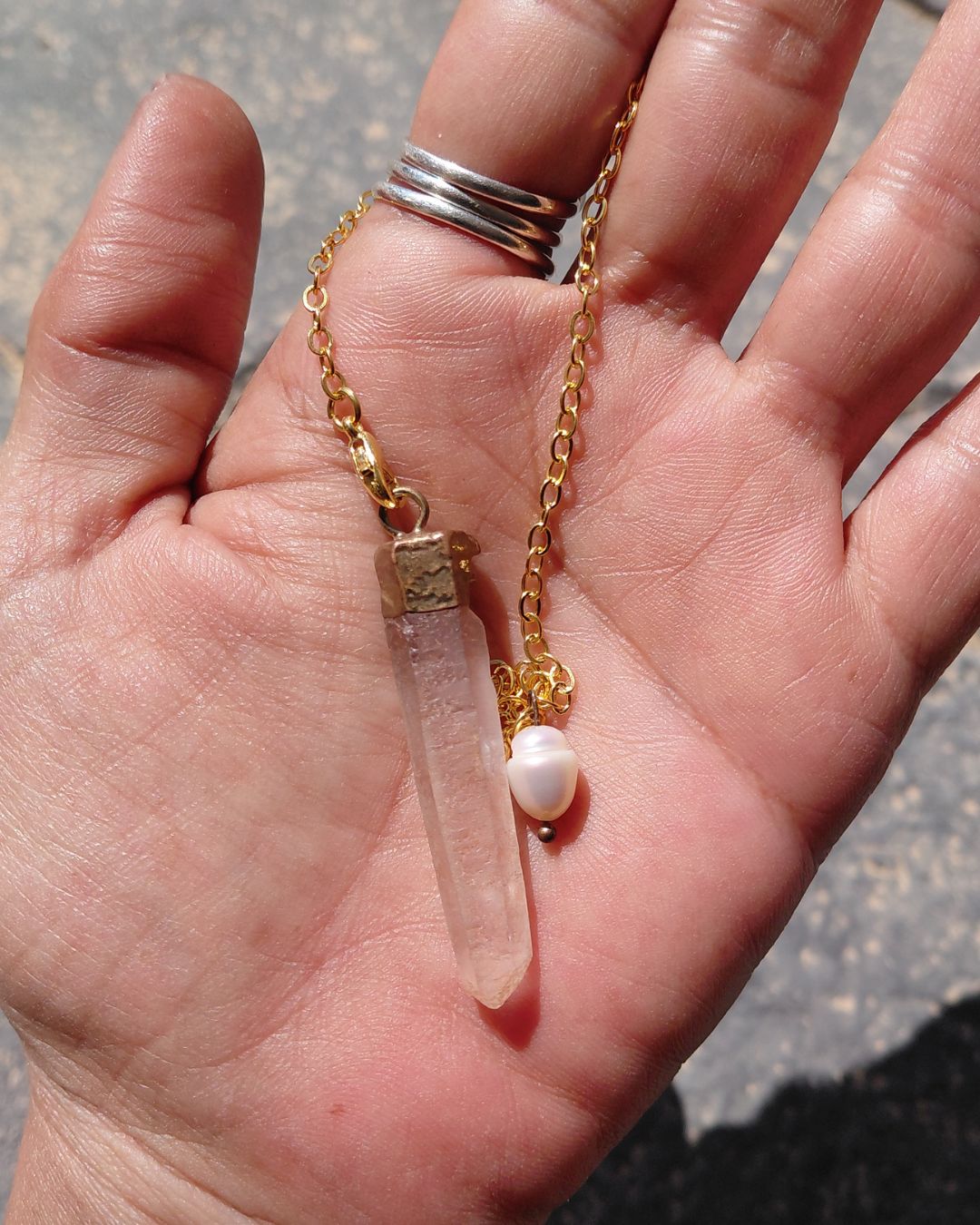 Invest in our Clear Quartz Pendulum from our genuine Crystal Pendulums Collection in Lebanon at Sacred!