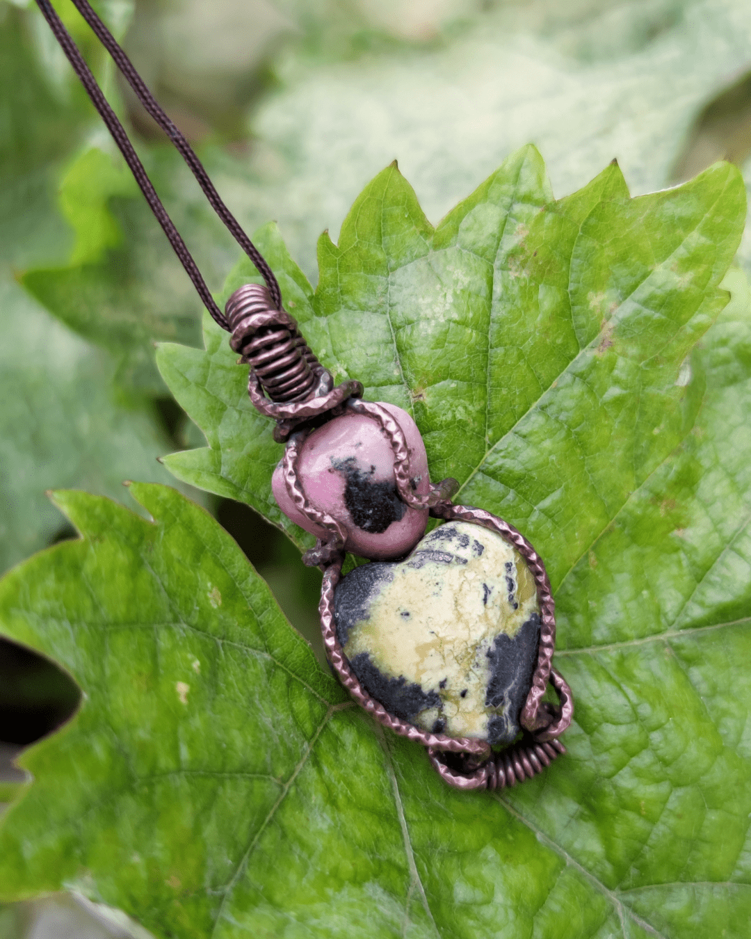 Experience Deep Alignment with our Andalouse! Invest in our Rhodonite & Serpentine Necklace in Lebanon at Sacred!