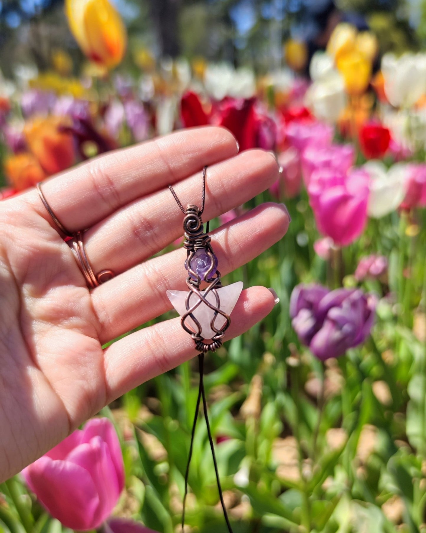 Awaken your Heart with Aurora. Invest in our handcrafted Rose Quartz & Amethyst Necklace from our Energy Cleansing Jewelry Collection at Sacred in Lebanon.