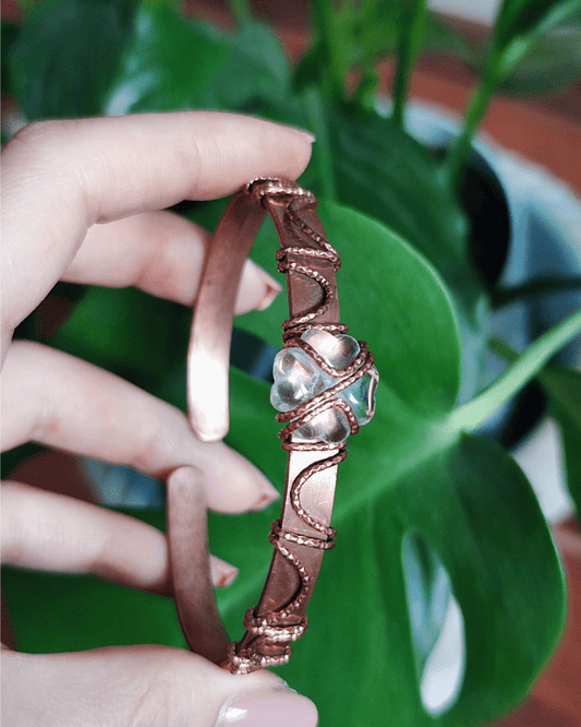 Elevate your vibration! Invest in our Clear Alignment • Clear Quartz Clover Copper Arm Cuff from our Energy Cleansing Jewelry Collection in Lebanon at Sacred.