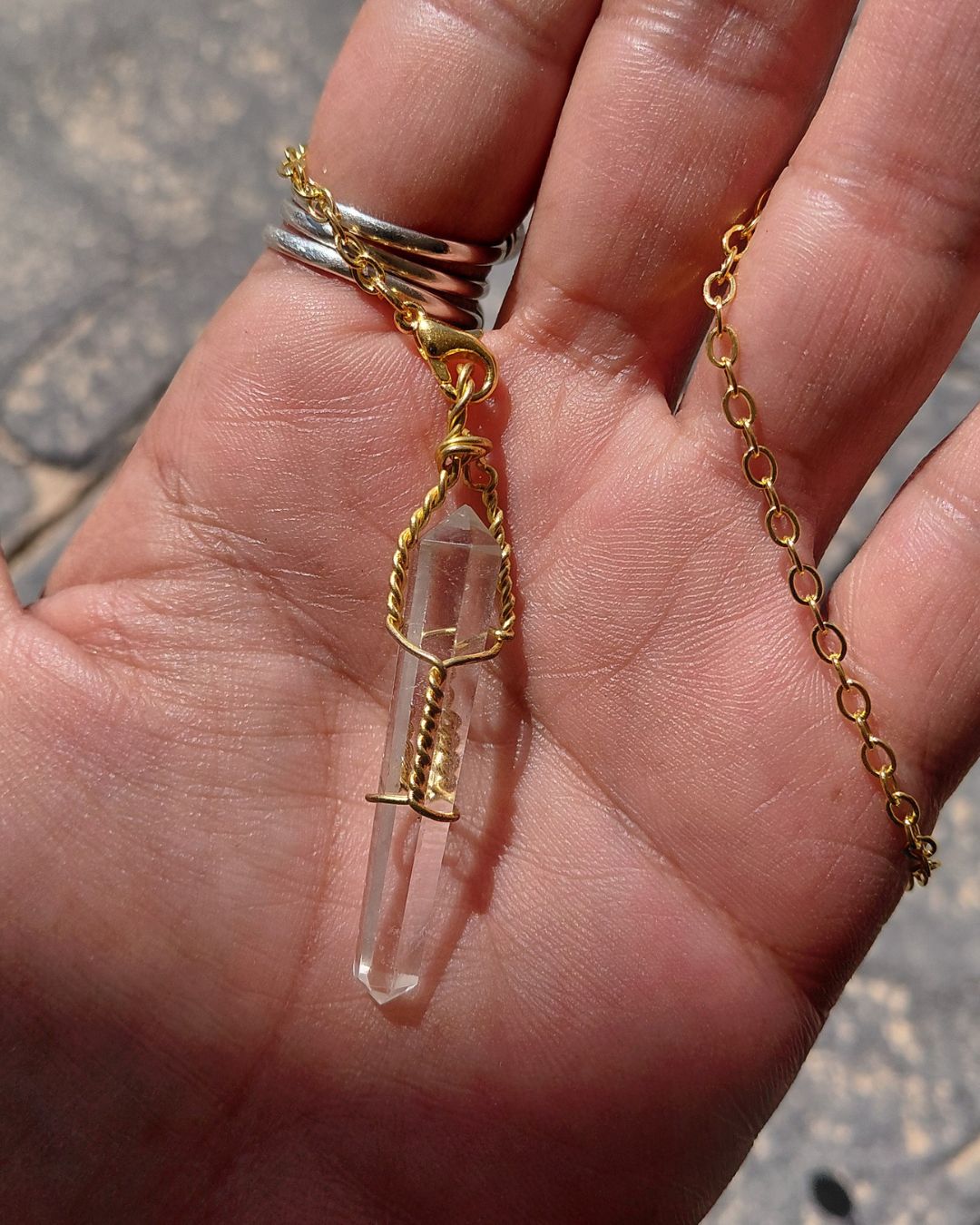 Invest in our Clear Quartz Pendulum from our genuine Crystal Pendulums Collection in Lebanon at Sacred!