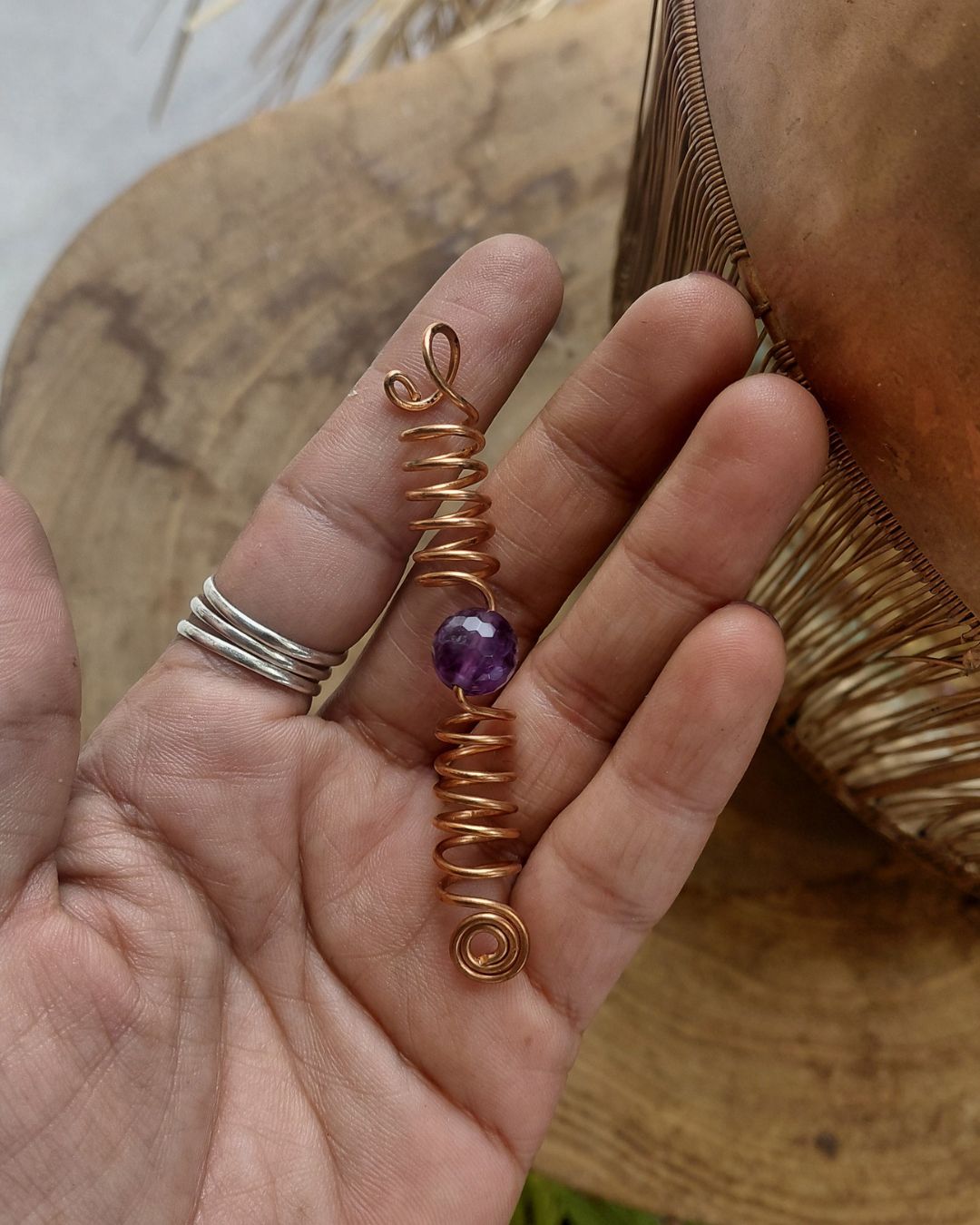 Adorn your Crown with Magic. Handmade copper loc coils with natural crystals, crafted in Lebanon. Find your unique hair jewelry at Sacred.