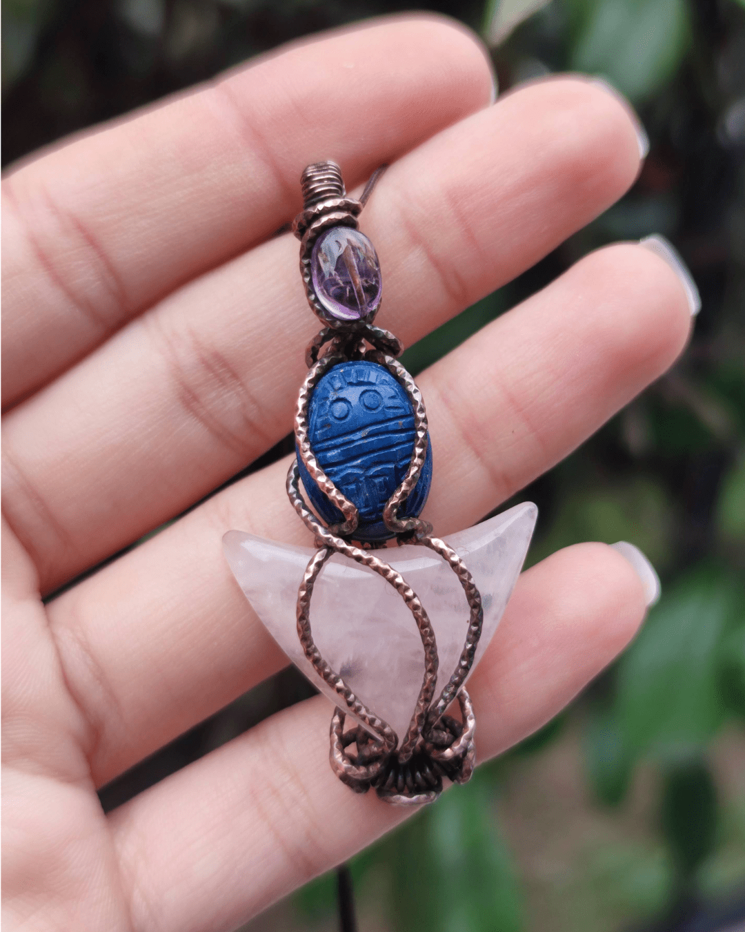 Celebrate your Rebirth with our Divine Blue Scarab. Invest in our Amethyst, Lapis & Rose Quartz Pendant from our High Vibration Jewelry at Sacred in Lebanon.