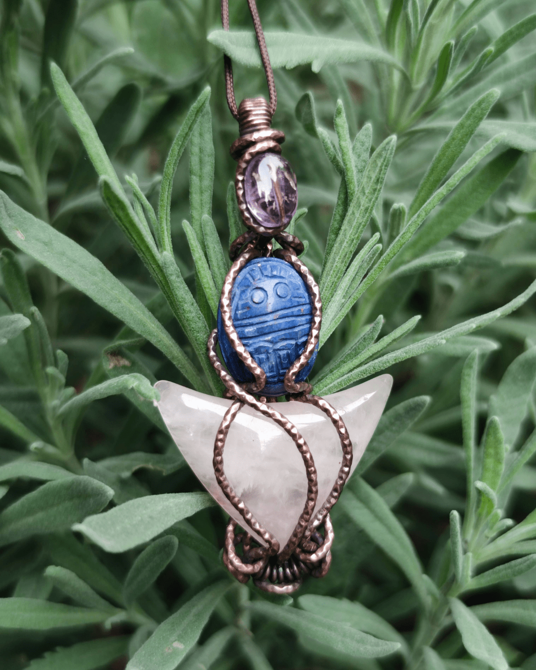 Celebrate your Rebirth with our Divine Blue Scarab. Invest in our Amethyst, Lapis & Rose Quartz Pendant from our High Vibration Jewelry at Sacred in Lebanon.