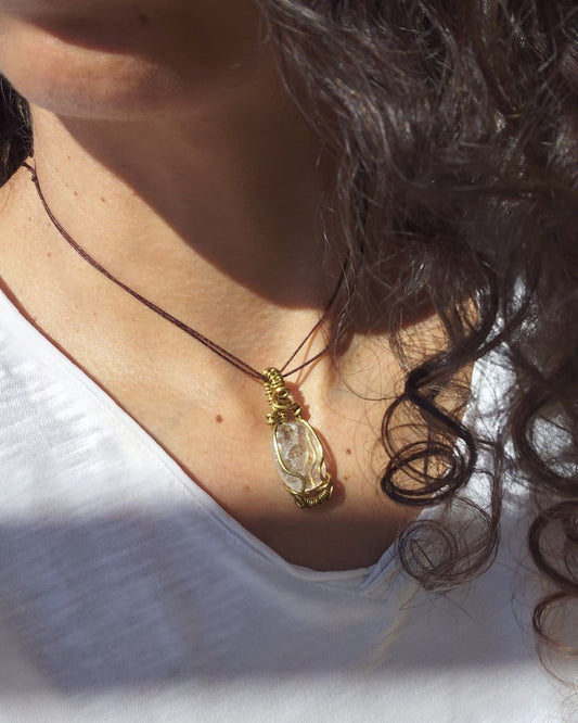 Connect to Higher Consciousness with Divine in Brass Invest in our Clear Quartz Pendant at Sacred in Lebanon.