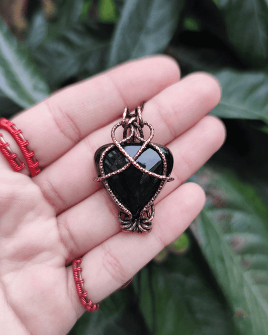 Invest in our Magic Necklace - Onyx for Grounding - from our crystal wrapped in copper jewelry in Lebanon at Sacred!