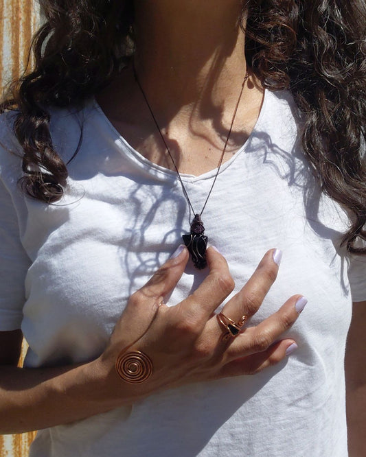 Awaken your fire with Magma. Invest in our Black Agate & Ruby Pendant from our handcrafted Copper Pendant Collection in Lebanon at Sacred!