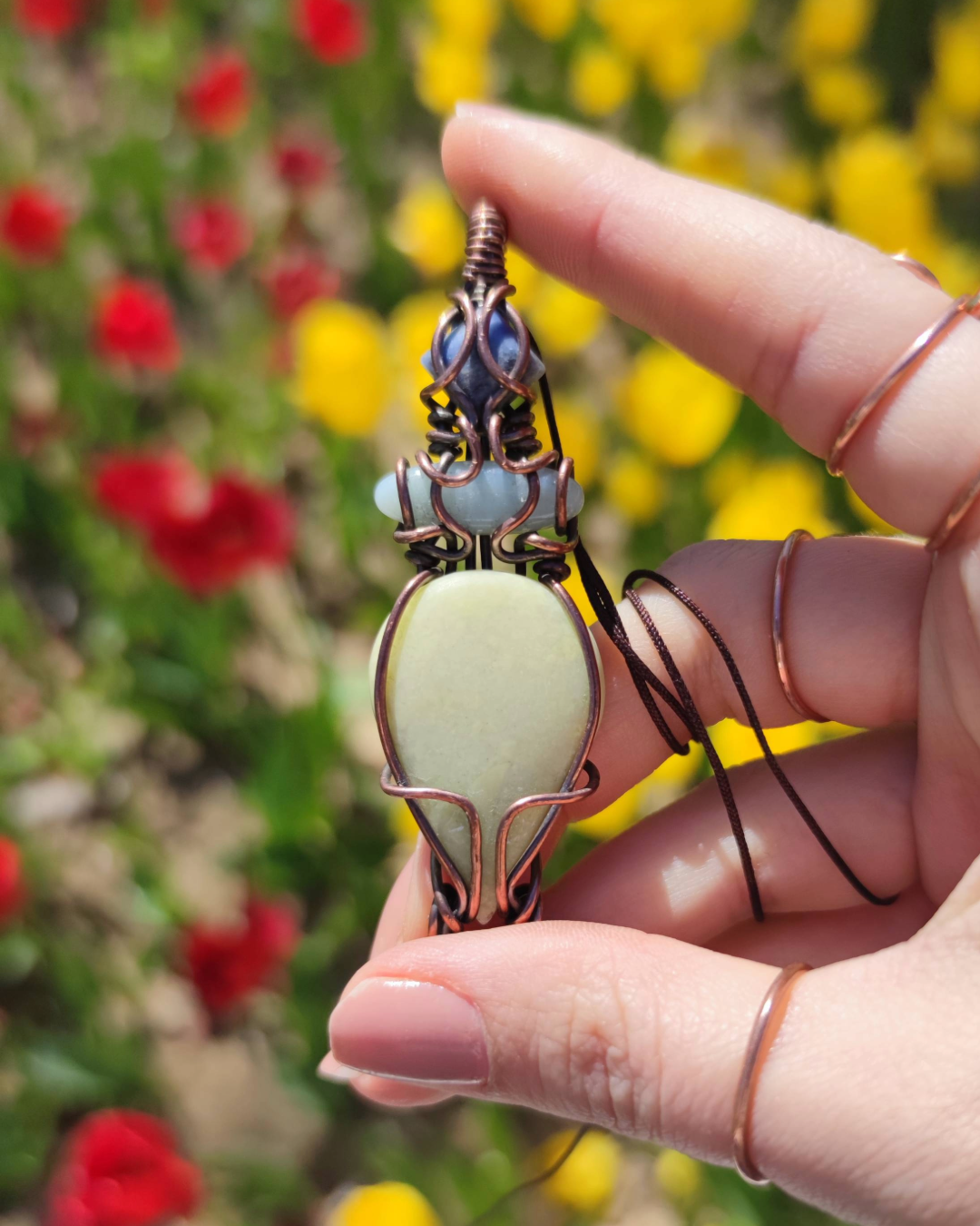 Channel Ancient Growth & vitality with Mayahuel. Invest in our our Aztec-inspired Sodalite, Amazonite & Serpentine Pendant at Sacred in Lebanon.