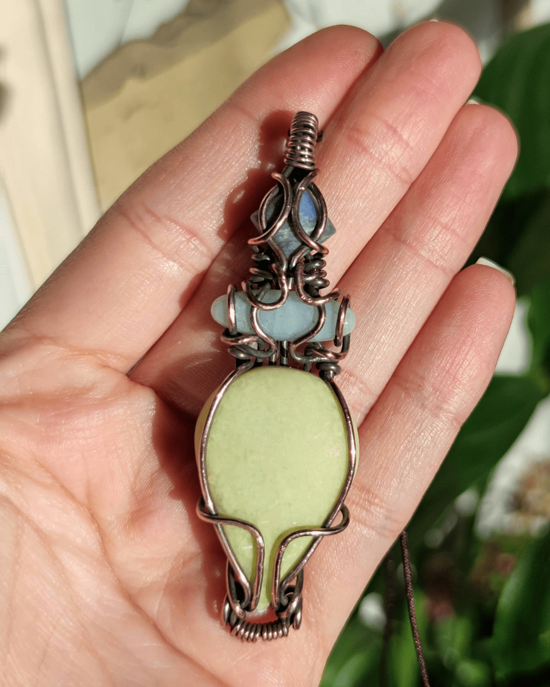 Channel Ancient Growth & vitality with Mayahuel. Invest in our our Aztec-inspired Sodalite, Amazonite & Serpentine Pendant at Sacred in Lebanon.
