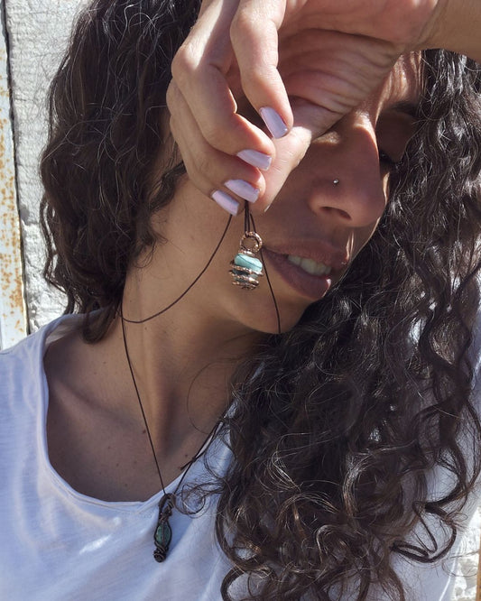 Invite Wealth with Nature's Heart. Invest in our Tumbled Emerald Pendant from our Handcrafted & Energy Cleansing Jewelry Collection at Sacred in Lebanon.