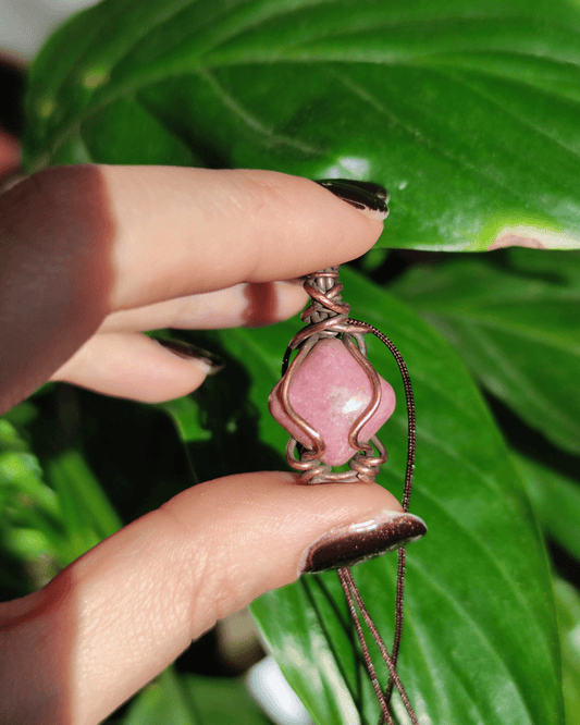 Reclaim your Sovereignty with Pink Highness. Invest in our natural Rhodonite Pendant from our Handcrafted Crystal Jewelry Collection in Lebanon at Sacred.