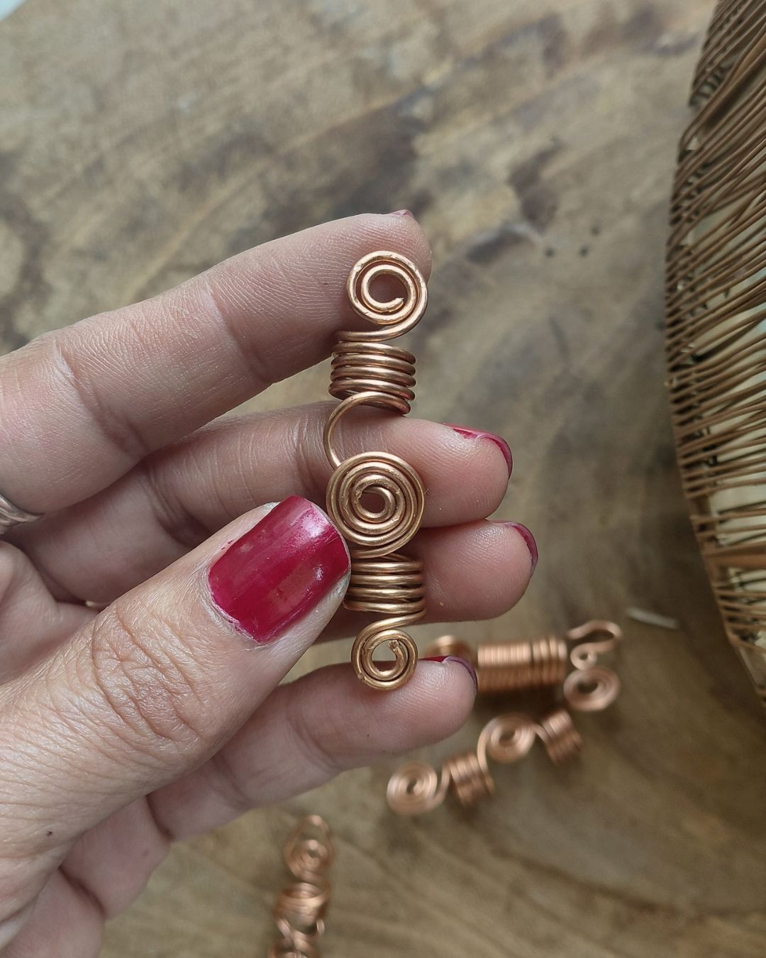 Extend your self-expression. Sleek, minimalist copper loc coils designed to embrace natural texture. Earthy hair jewelry, handmade in Lebanon at Sacred.