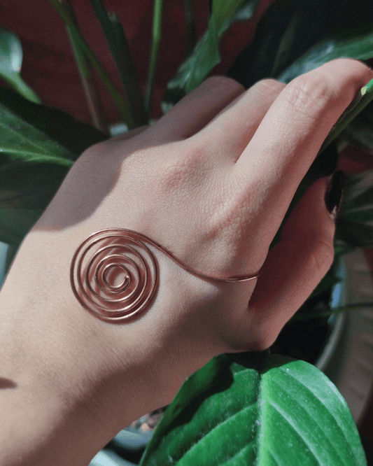 Amplify your bio-energetic flow! Invest in our Vortex • Pure Copper Palm Cuff & Energy Coil from our High Energy Jewelry Collection in Lebanon at Sacred.