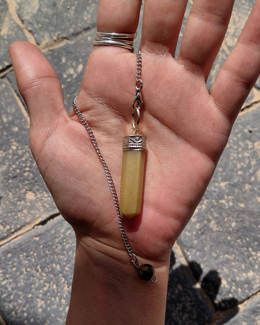 Invest in our Yellow Aventurine Pendulum from our genuine Crystal Pendulums Collection in Lebanon at Sacred!