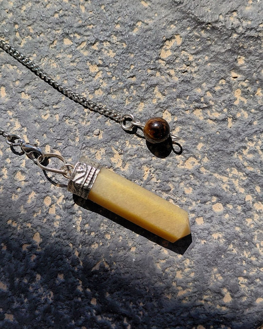 Invest in our Yellow Aventurine Pendulum from our genuine Crystal Pendulums Collection in Lebanon at Sacred!